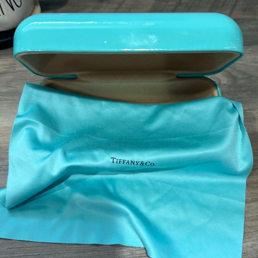 Used like new Tiffany sunglasses with case.